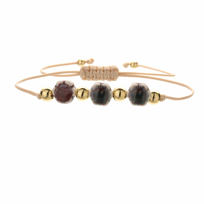 Venta caliente transfronteriza europea y americana pulsera de cerámica de flor de seis pétalos TEMU pequeña y fresca pulsera con cuentas de todo fósforo joyería spot al por mayor