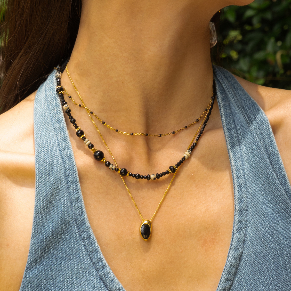Collar de acero inoxidable TENA Europa y América lujo ligero nicho universal piedra natural collar de acero titanio mujer cruzada venta caliente cadena clavícula