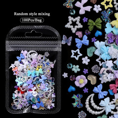 国境を越えて人気のバロックネイルの花のアクセサリーの透かし彫りの愛の真珠の蝶の爪のアクセサリーの混載