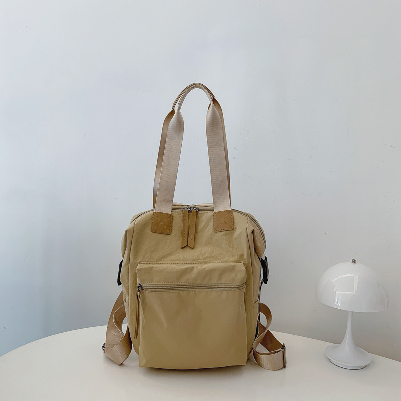 Bolsa de mano de gran capacidad 2025, nueva mochila de moda japonesa, mochila de hombro de estudiantes universitarios, mochila ligera, moda