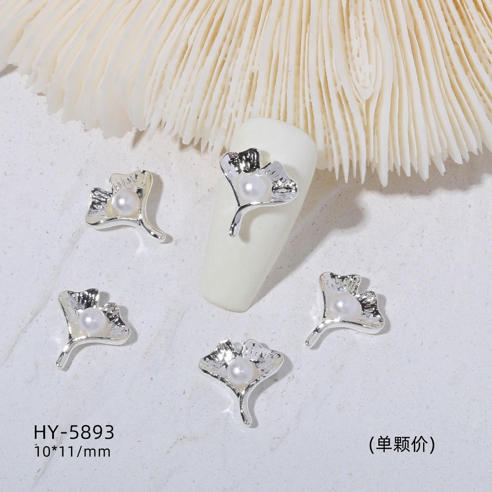 Venta caliente taladro de uñas arco de plata joyería tridimensional flash diamante esmalte de uñas decorativo diamante acabado pieza de uñas traje de joyería