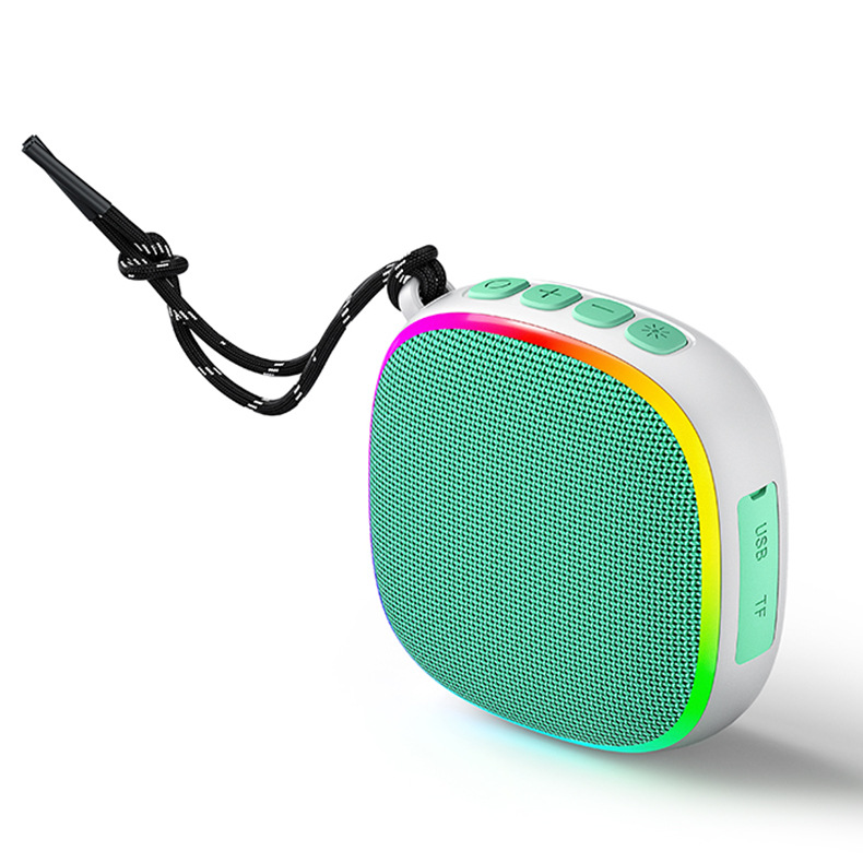 Al aire libre nuevo altavoz Bluetooth de absorción de tela subwoofer al aire libre impermeable portátil mini sonido al por mayor