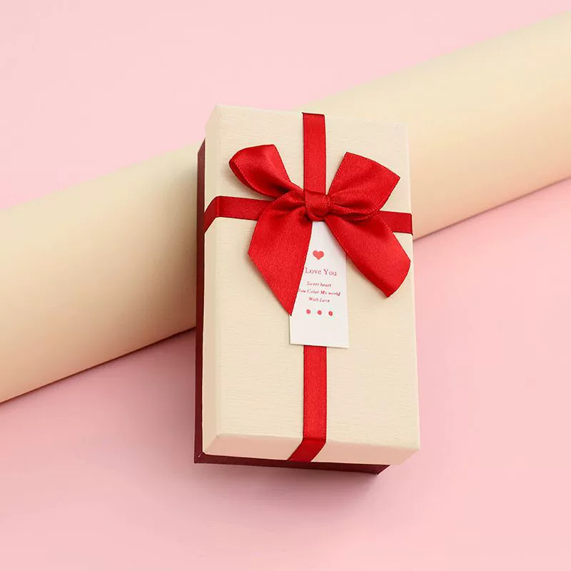 Rectangular lipstick with bow, cosmetic perfume, gift box