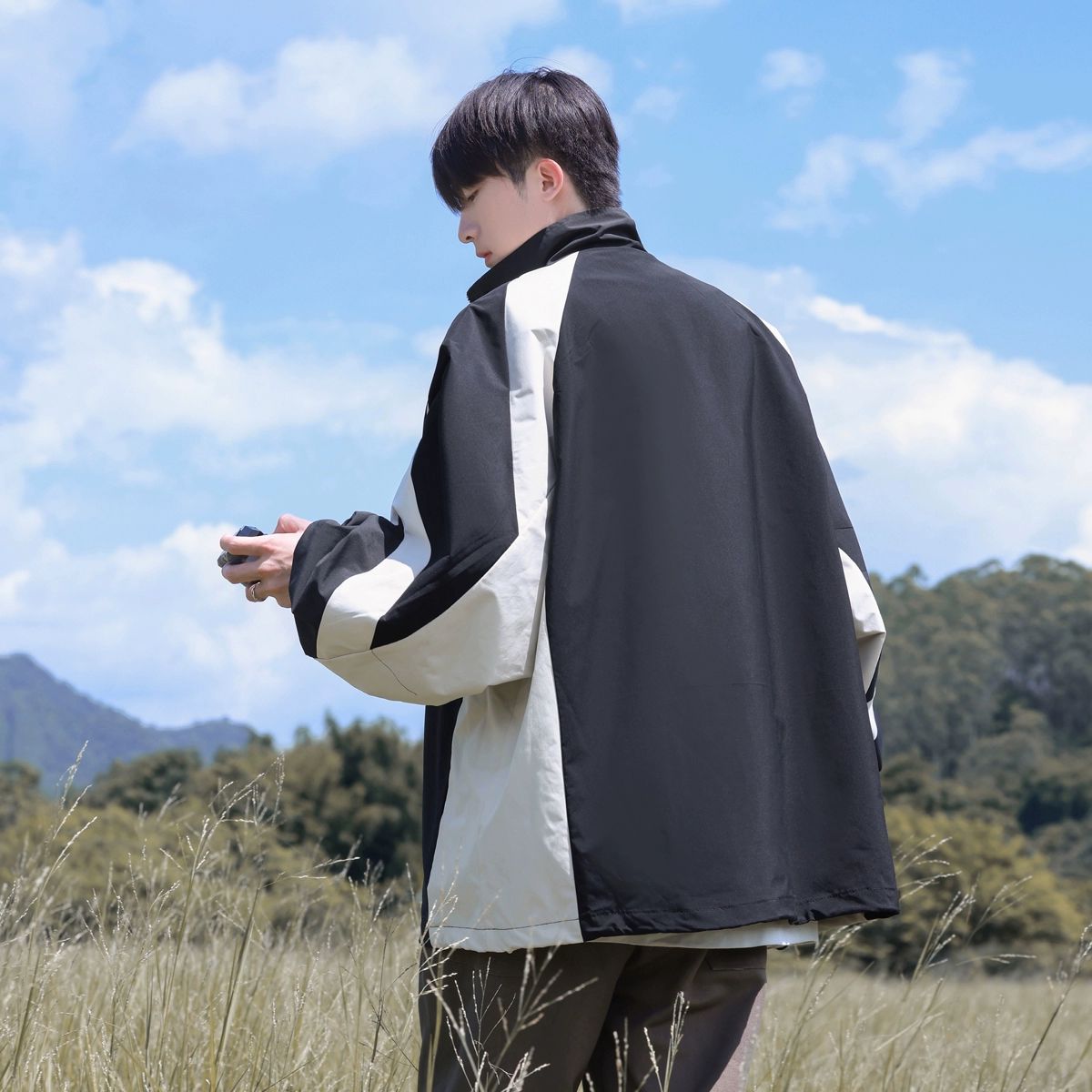 Chaqueta de cuello alto de estilo americano para hombres otoño 2023 nueva chaqueta deportiva de protección solar funcional de ocio al aire libre