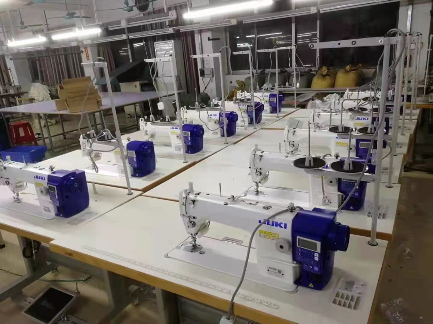 Venta al por mayor nuevo japonés JUKI máquina pesada DDL7000A sola aguja automática máquina de coser plana máquina de coser industrial de coche plano