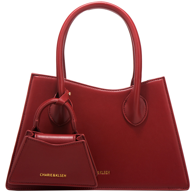 [Two Innocent] Bolso de mano rojo para boda, bolso de gama alta, bolso cruzado para mujer, para ir al trabajo, 2025