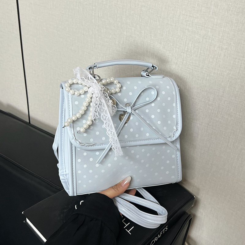 Bolsa de moda coreana lindas bajo las axilas 2026 primavera nueva bolsa de viaje simple, mochila de moda casual de alto valor.