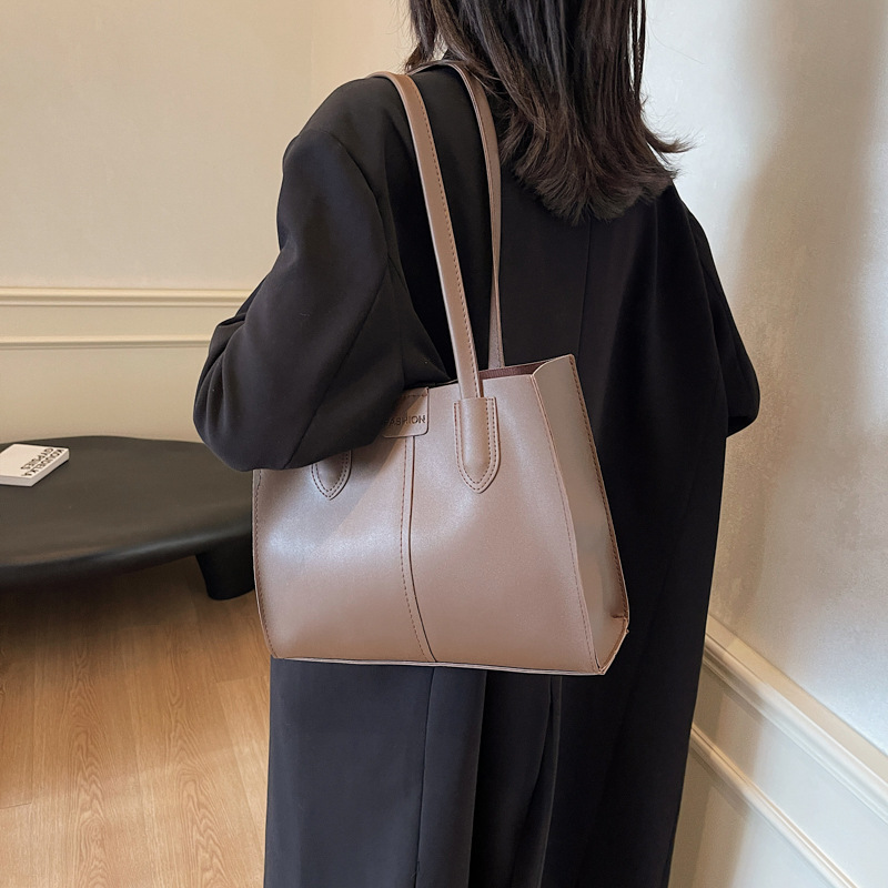 Retro textura de viaje coreano bolsos de mano estudiantes de moda simple bolsos de hombro de gran capacidad bolsos de brazo para mujeres