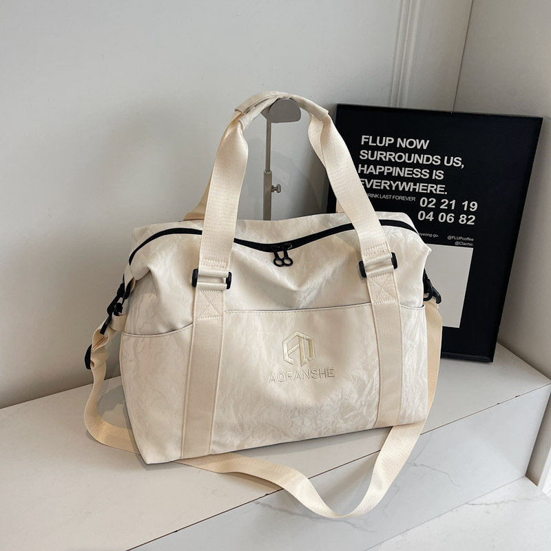 2025 nueva gran capacidad simple bolsas de viaje de mano bolsas deportivas de ocio bolsas de acondicionamiento de la ropa ligeras bolsas inclinadas para mujeres