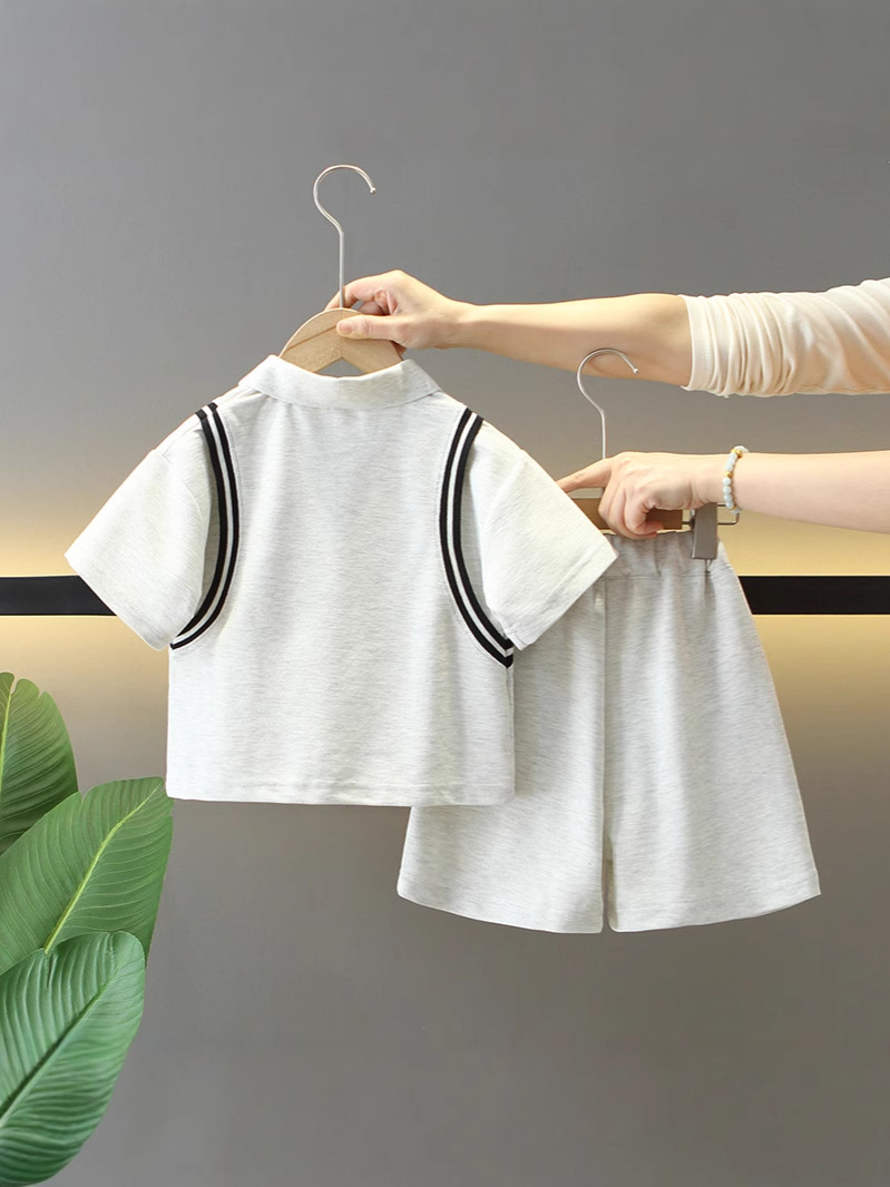 7880 traje de verano para niños 2025 nueva camisa POLO de manga corta para niños de dos piezas ropa de moda de verano para bebés