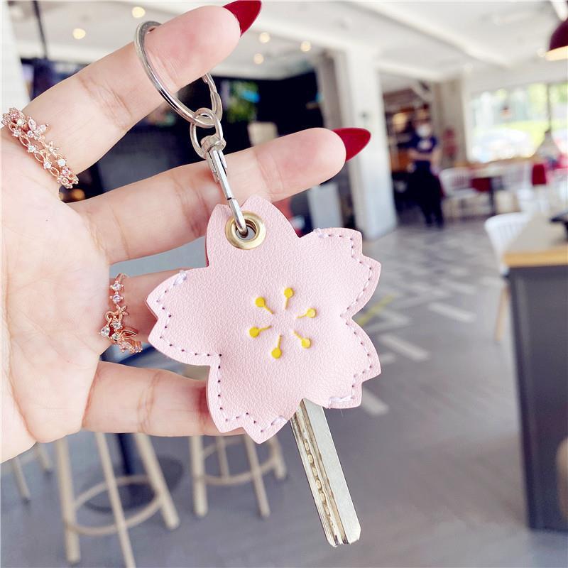 Cubierta de la llave nuevo corazón de niña explosiva Llavero Coche eléctrico PU Cubierta de la tarjeta de control de acceso para el hogar Sensor de gota de agua Amazon