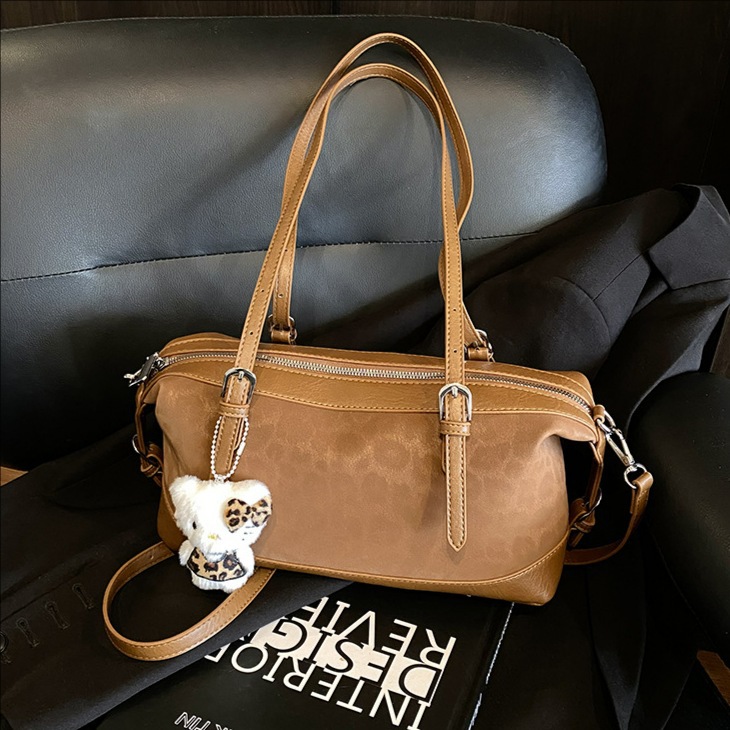 Bolsa de almohada retrógrada de leopardo bolso de mano de viaje para mujeres otoño y invierno 2025 nueva moda simple bolso de hombro axilar