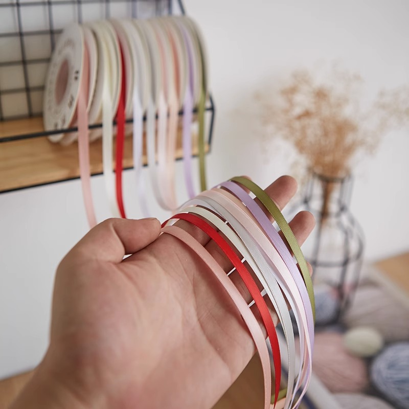 Floristería de 1cm Cinta de poliéster de doble cara al por mayor Cinta de color sólido Material de embalaje de flores Hornear ramo de flores Cinta