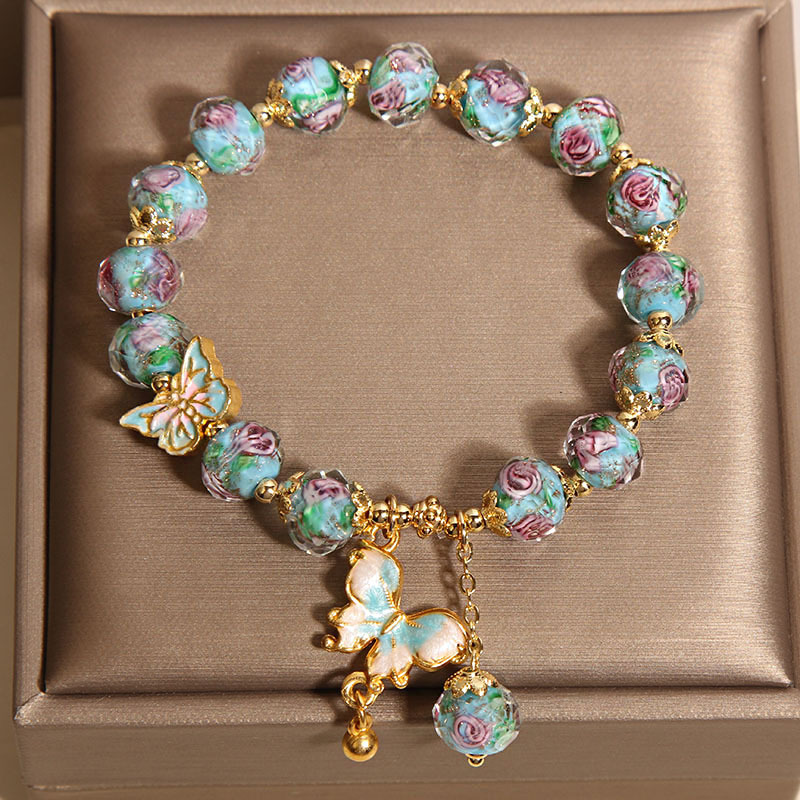 Nueva pulsera de vidrio azul de jardín de rosas de estilo chino para mujer, pulsera colgante de mariposa de lujo ligero de nicho, joyería de alta calidad