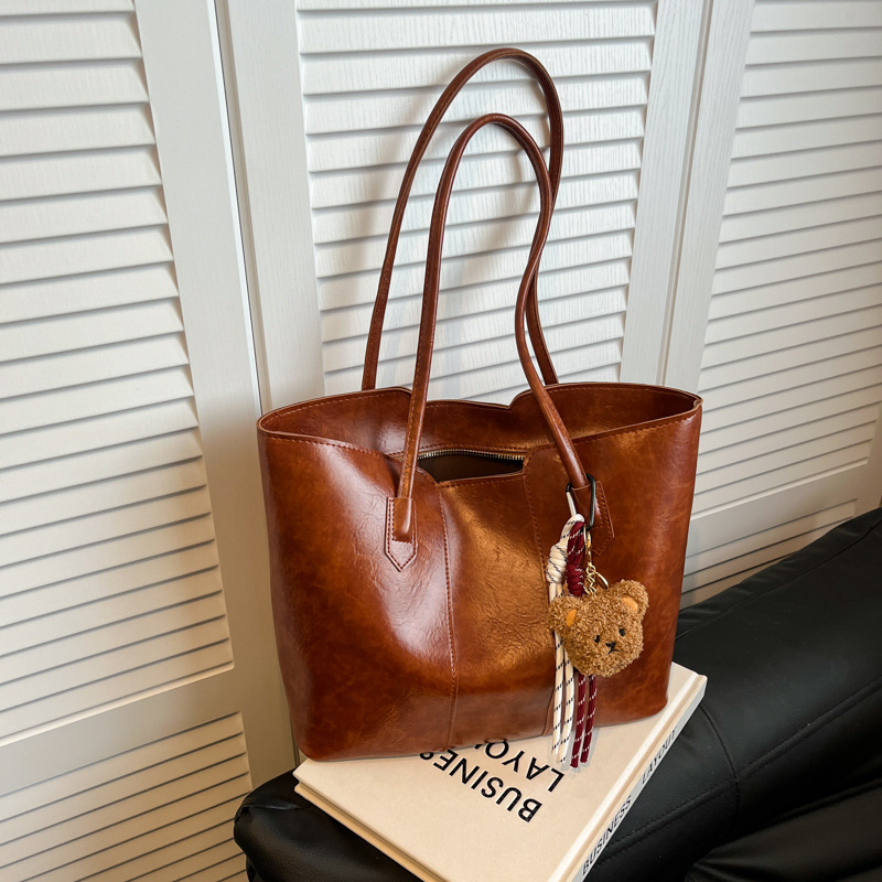 Bolso de gran capacidad de viajero de temperamento de alta gama para mujer 2024 nuevo otoño e invierno bolso de hombro de lujo ligero bolso de ocio