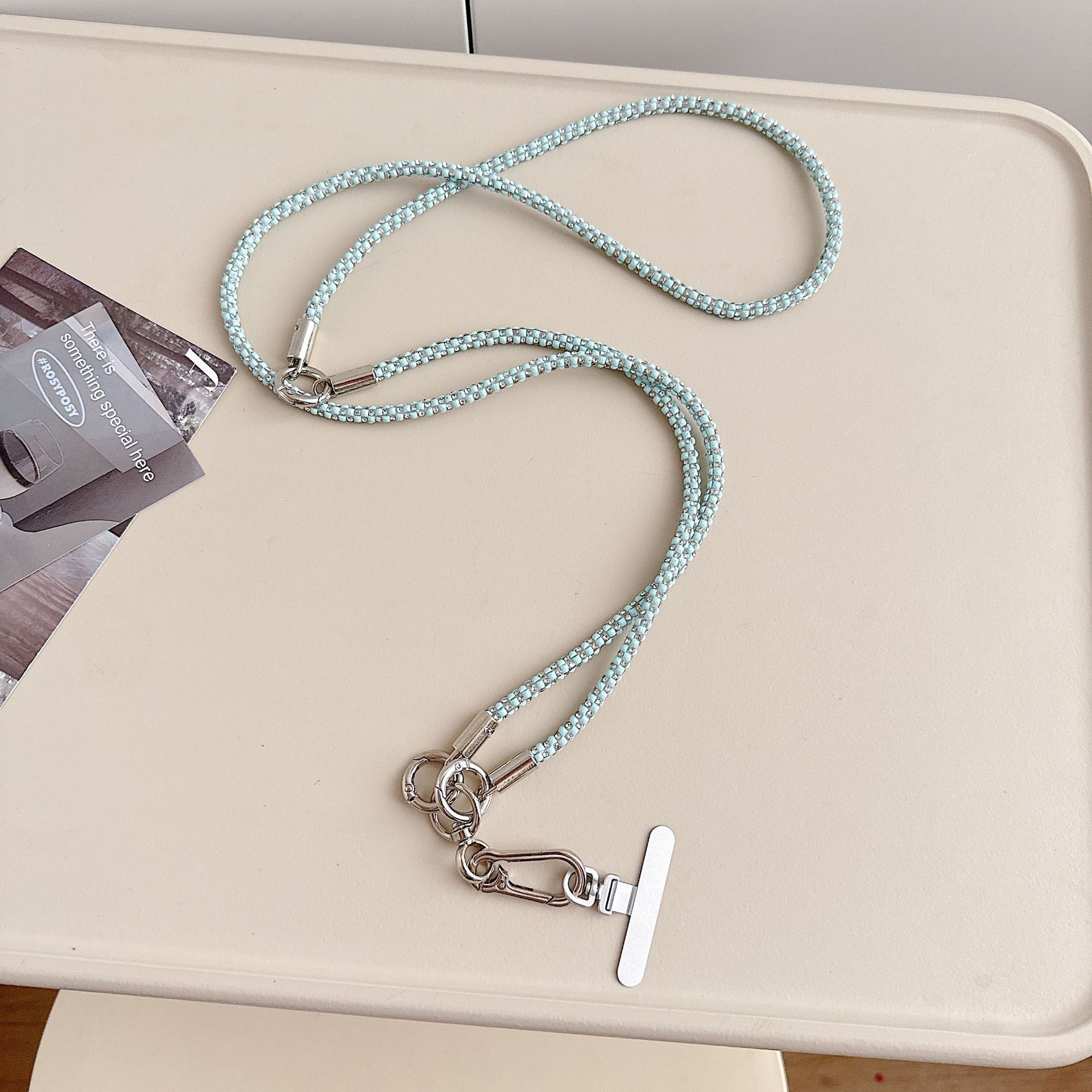 Cadena de teléfono móvil de alta gama hecha a mano de boutique, cordón de teléfono móvil de moda tres en uno de diamantes de lujo, mensajero largo/colgante