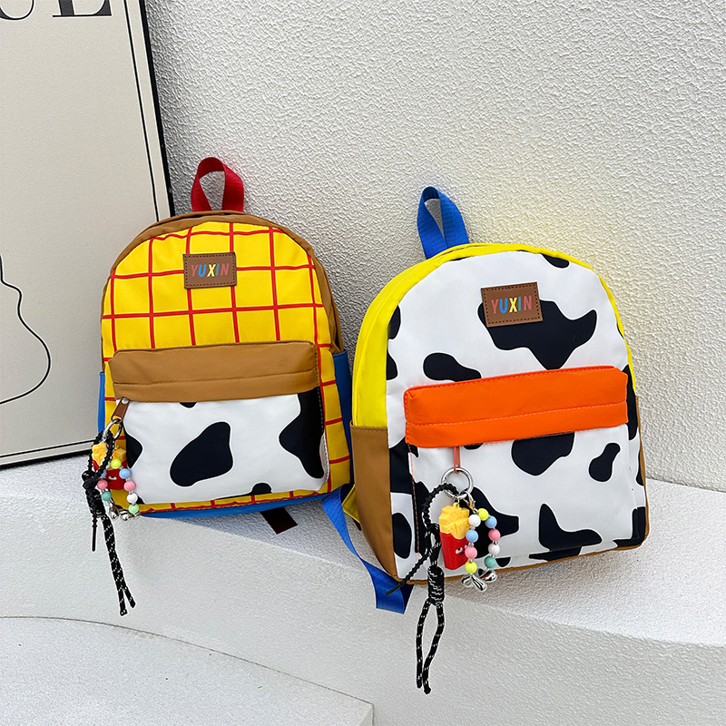 Mochila japonesa simple y ligera de doble hombro, jardín de infantes de dibujos animados de gran capacidad, mochila encantadora para niños y niñas.