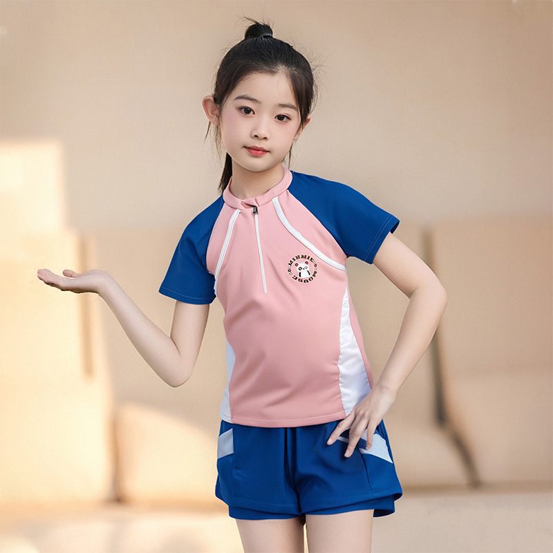 Niños trajes de baño de poliéster niña pequeña versión coreana de una pequeña falda deportiva fresca junior trajes de baño de aguas termales al por mayor