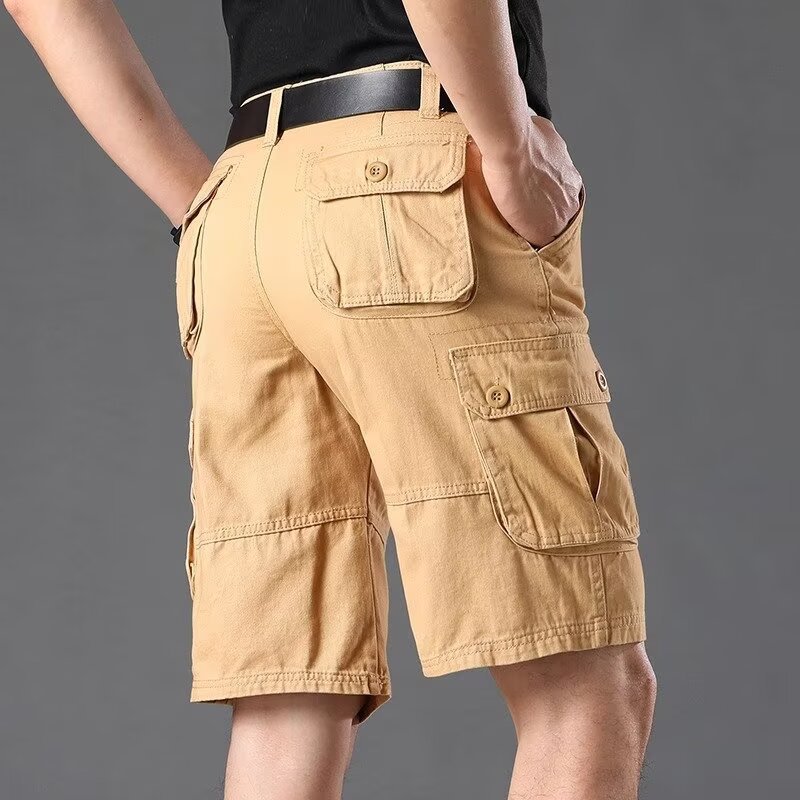 Inventario de verano pantalones cortos sueltos de bolsillo pantalones de herramienta de moda pantalones elásticos de cinco puntos pantalones casuales delgados para hombres