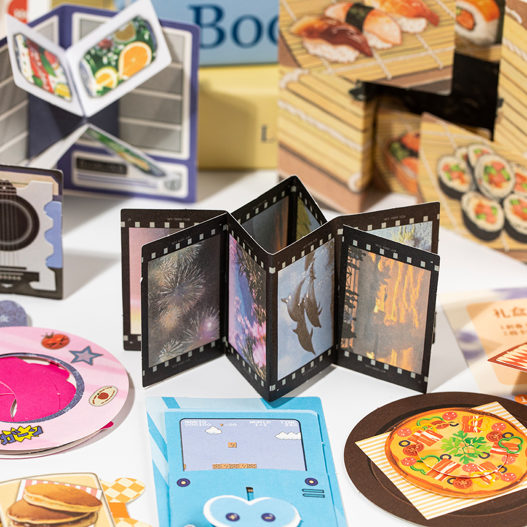 Una colección de instituciones de idioma y ocio este fin de semana, libro de contabilidad manual tridimensional creativo y divertido, libro de órganos de rompecabezas plegable