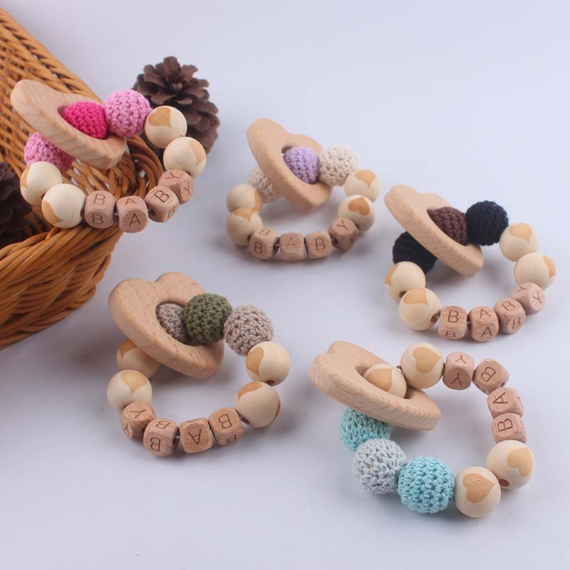 Bebé suministros de dibujos animados de haya amor mordedor creativo DIY dibujos animados amor patrón mordedura pulsera teether juguete
