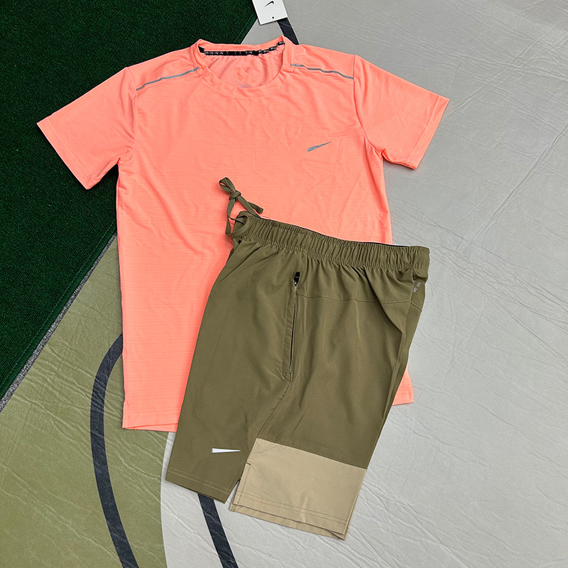 Mayorista nuevo juego de comercio exterior deportivo fitness juego de carrera rápida secado transpirable suelto ocio pantalones cortos de manga corta ropa de hombre