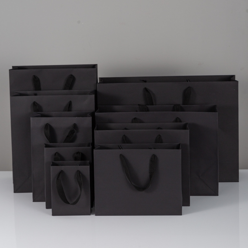 现货批发黑色礼品袋纸袋包装服装黑卡印LOGO手提袋厂家