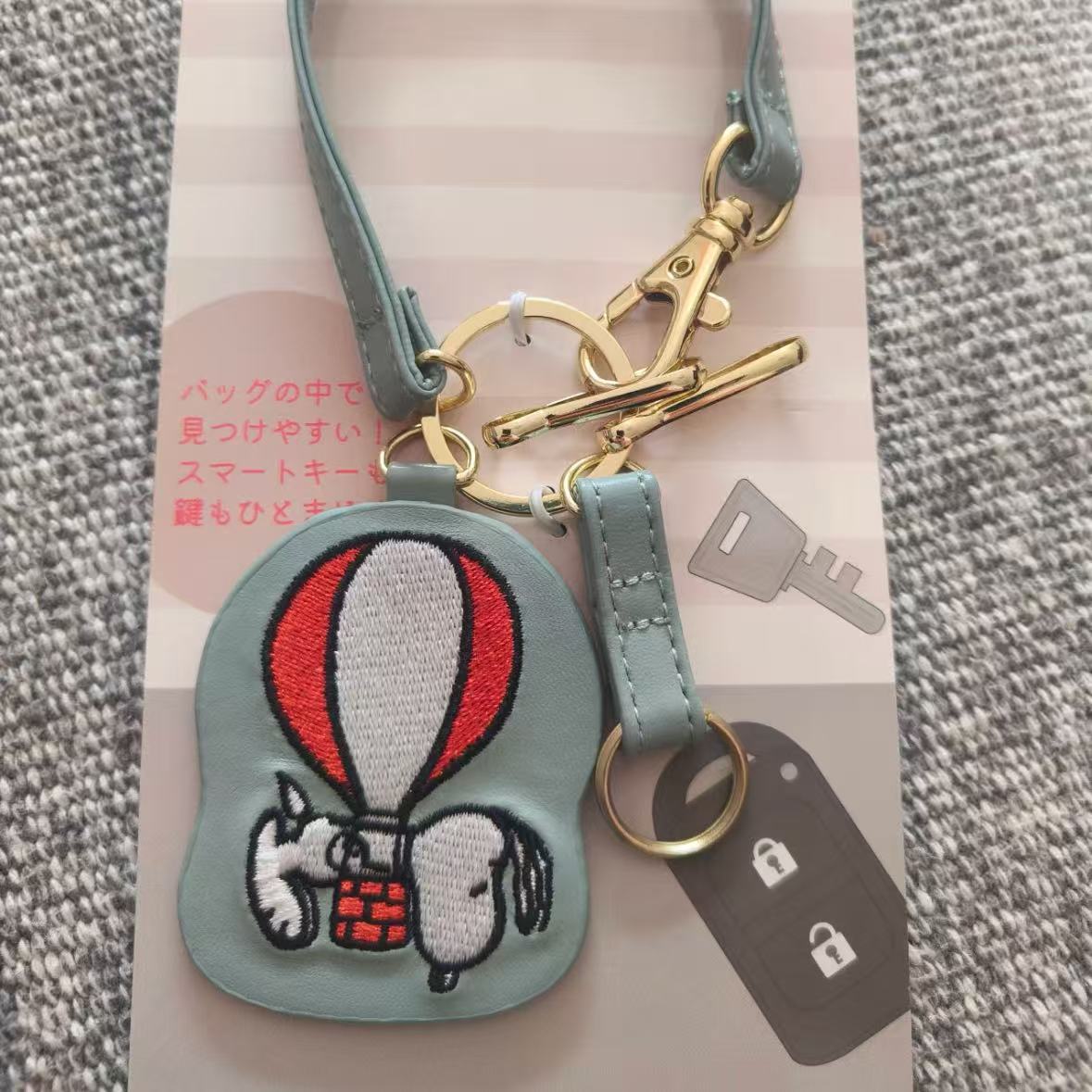 Inventario japonés Snoopy llavero colgante lindo dibujo animado exquisito bordado cuero llave de coche colgante image 7