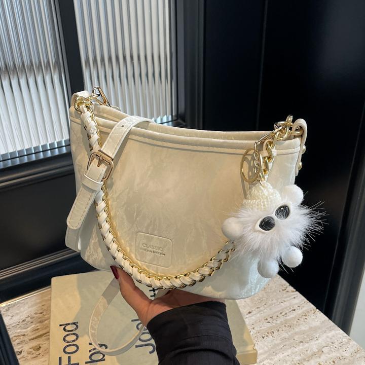 Bolso de mano de súper fuego único extranjero para mujer 2025 nuevo bolso de cubo de ocio simple bolso de mensajero de alta gama de moda coreana