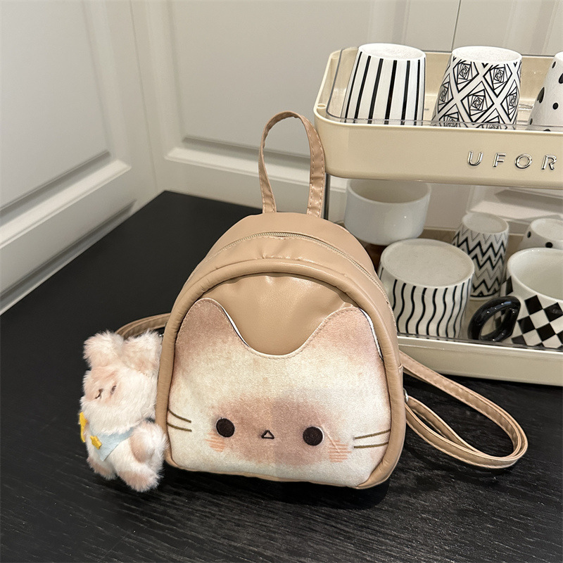Mochila de dibujos animados de alto nivel para mujeres 2025 nueva moda mochila de viaje, mochila de mamá, mochila escolar casual coreana.