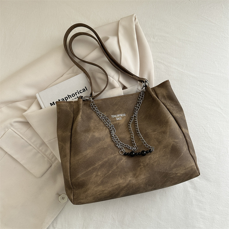 Bolsa de hombro retro de gran capacidad para viajar a la cadena de trabajo para mujeres 2024 primavera y verano nicho bolsas de brazo bolsas de moda