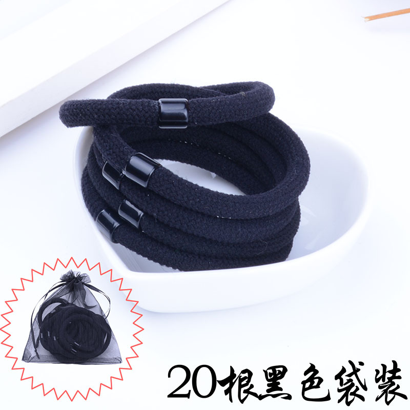 20 bandas de pelo negro en bolsas