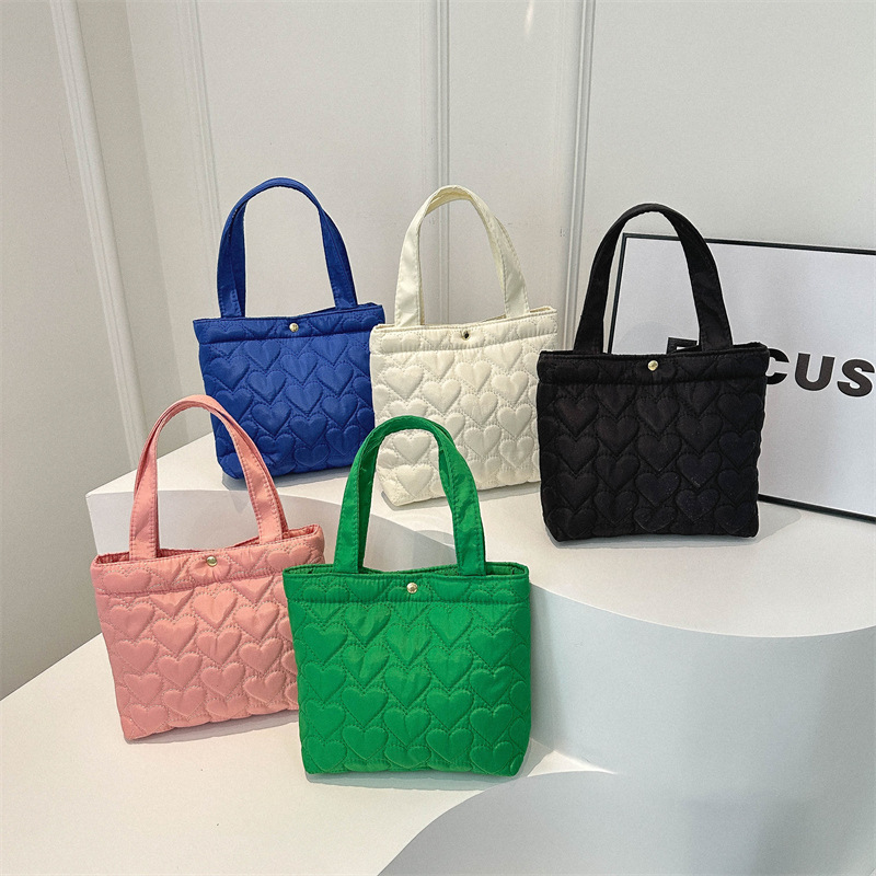 Bolsa de ocio simple de gran capacidad para mujeres 2024 primavera nueva bolsa de ocio simple para estudiantes de mano ligera para mujeres
