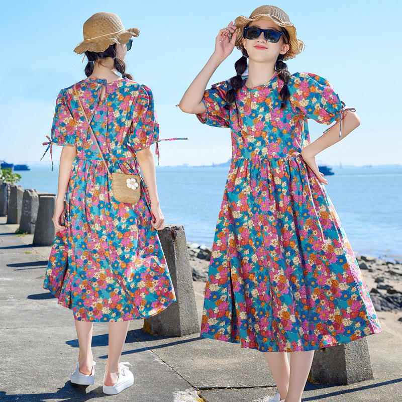 Vestido para niñas de manga corta Verano 2024 nuevo vestido de princesa artística suelta con estampado de flores para niños medianos y grandes