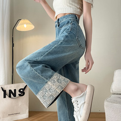 新中国式のワイドジーンズの女性の夏の薄いモデルのゆるい梨の形の小柄な刺繍はまっすぐな筒のズボンをつなぎ合わせます。