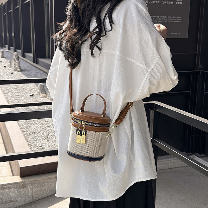 Bolso de cubo de costura de bolso de estilo occidental transfronterizo 2025 nuevo bolso de hombro de color de contraste de moda bolso de mensajero de sentido avanzado