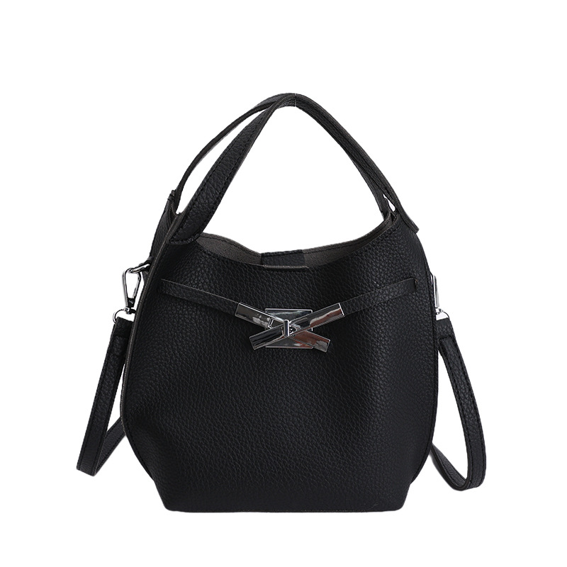 Bolso de mujer nuevo estilo coreano nicho de moda lichi bolso de cubo portátil de alta sensación de ocio mochila de viaje