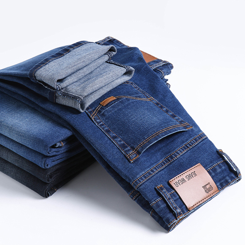 Ventas directas de fábrica de jeans para hombres Versión coreana de pantalones de mezclilla Xintang casuales elásticos de negocios para hombres de talla grande