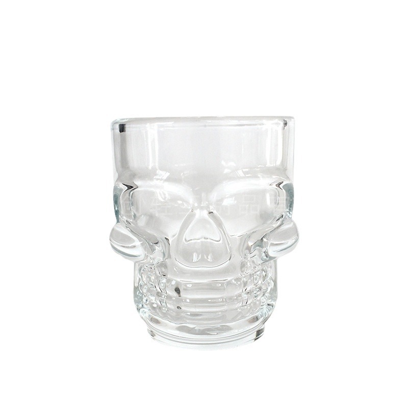 Suministro directo de fábrica 50ml pequeña copa de vino taza de calavera pequeña vela Taza pintada a mano pequeños espíritus vidrio transparente lleno de cera
