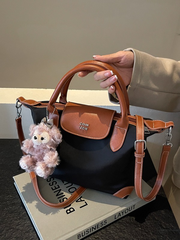 Nylon color contrastante empalme bolso de bolsillo portátil mujer 2024 nuevo estilo transfronterizo de alta calidad exquisita mochila de hombro