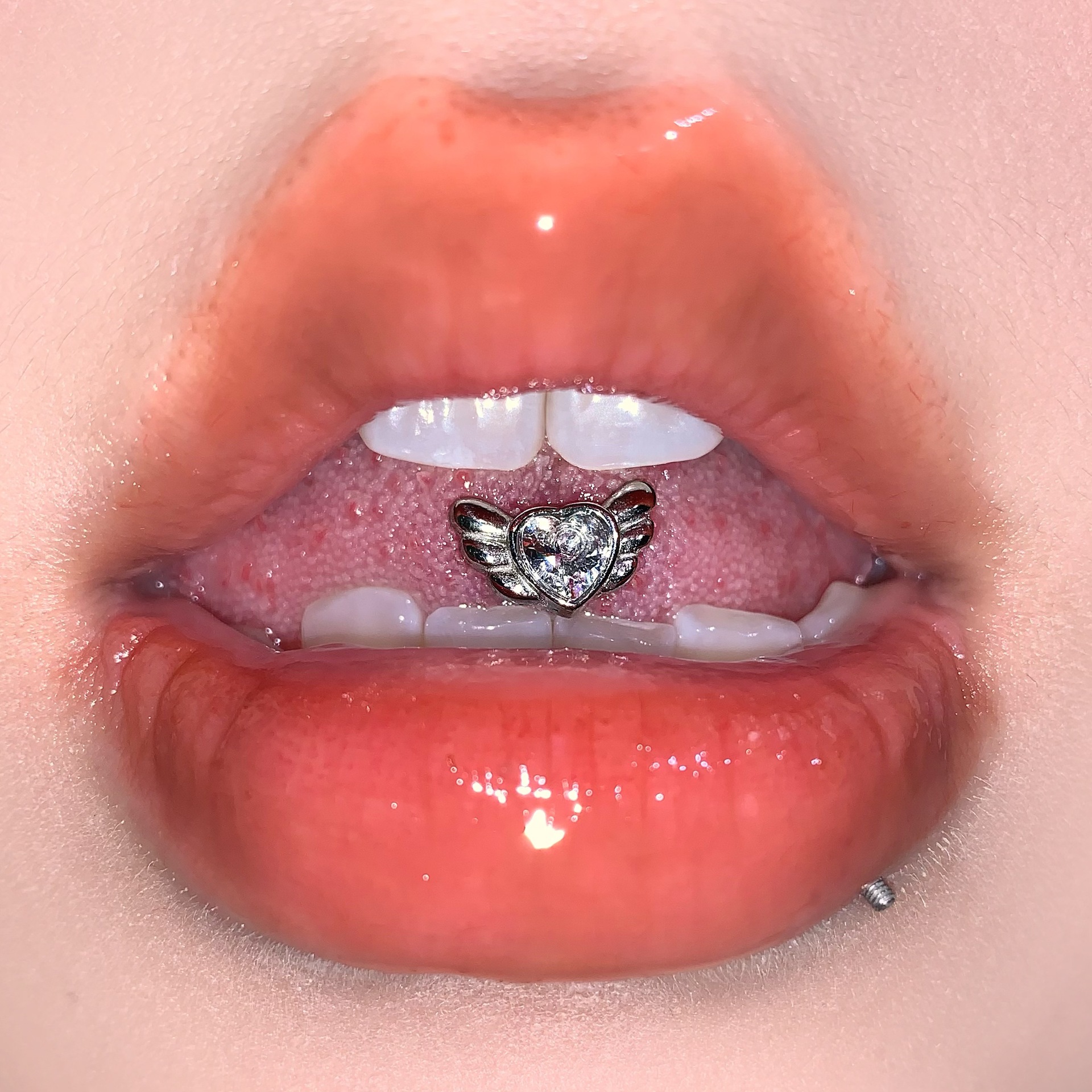 Silver pointed spike labret stud material detail