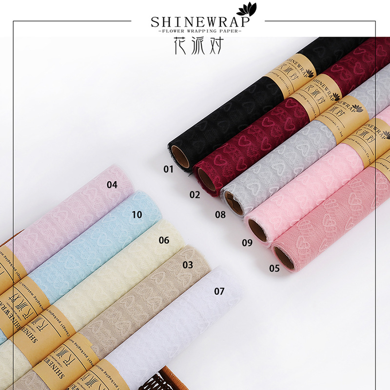 Fábrica de fiestas de flores al por mayor nuevo amor Jacquard flor envasado hilo de malla florista de color sólido