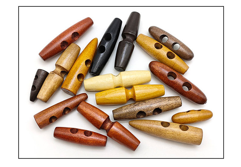 双孔木头橄榄扣 仿牛角纽扣 装饰木质纽扣 (20).jpg