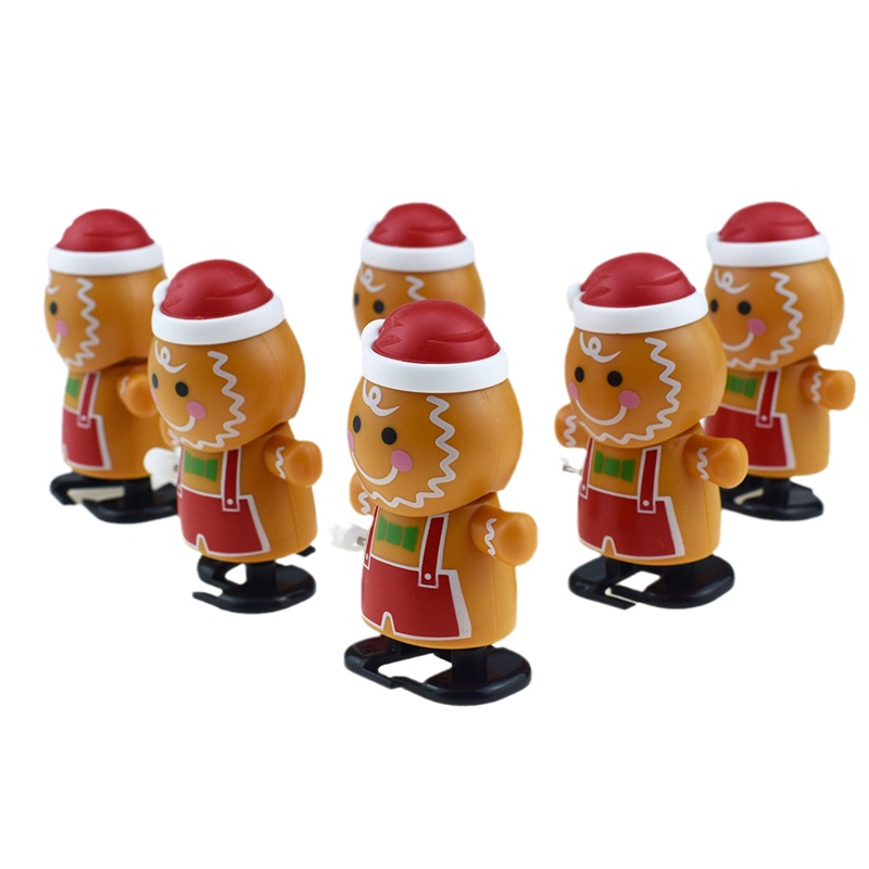 Novedoso Reloj Que Camina Sacudiendo La Cabeza Biscuit Man Figuras De Juguete Bobinado Walking Biscuit Villain Juguete De Navidad Regalo display picture 2