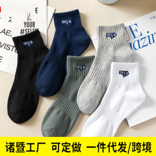 Spring and Autumn new socks men's mid-calf polyester cotton socks solid color black and white sports tide socks comfortable breathable short men's socks wholesale