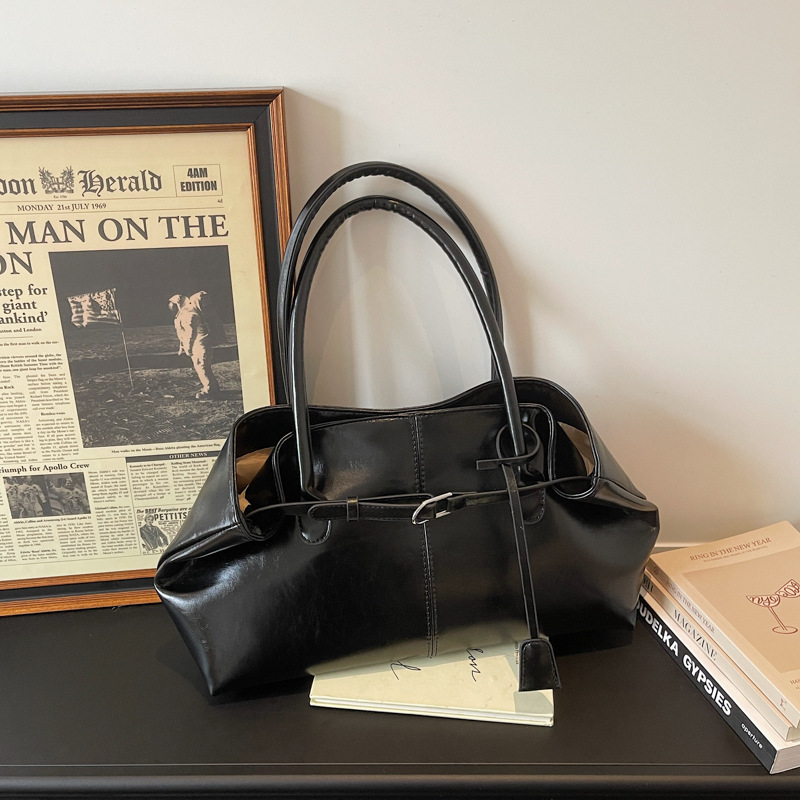 Bolsos de tendencia diaria coreana 2026 primavera nueva moda simple gran capacidad bolso de hombro bolso especial