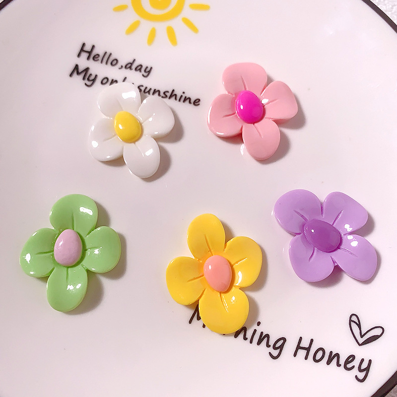 Accesorios de resina de cuatro pétalos de macarrón transfronterizo DiDi accesorios para el cabello de la caja del teléfono móvil agujero de los zapatos colgantes pequeños materiales hechos a mano
