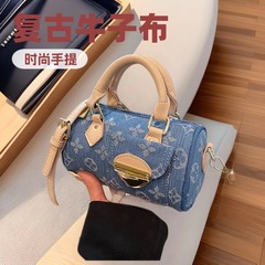 女性のバッグの新しいハンドバッグは花のデニムの斜めのショルダーバッグの小さい大衆の欧米の潮流のレトロなショルダーバッグの潮流の女性のカバンを編みます。