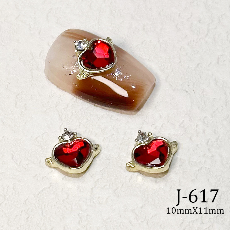 2023 Nueva joyería de uñas Año nuevo rojo aleación conejo rojo mariposa de cristal pintura en aerosol arco accesorios de diamantes de uñas