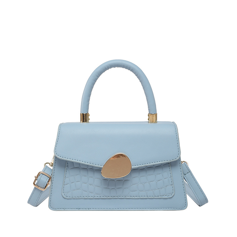 Textura hebilla magnética bolso de moda simple 2025 primavera nuevo estilo ins bolso de mensajero de un solo hombro elegante bolso cuadrado femenino